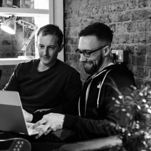 Employees working together for Geeky Tech, a B2B Web Marketing Agency