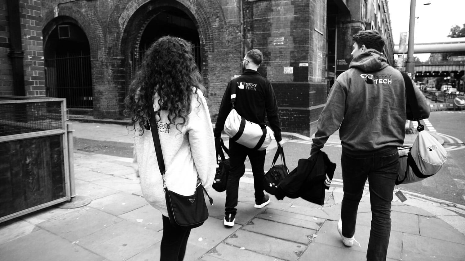 Nicole Christian and Alan handing out bags