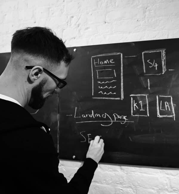 Ben working on B2B SEO Strategy on our blackboard